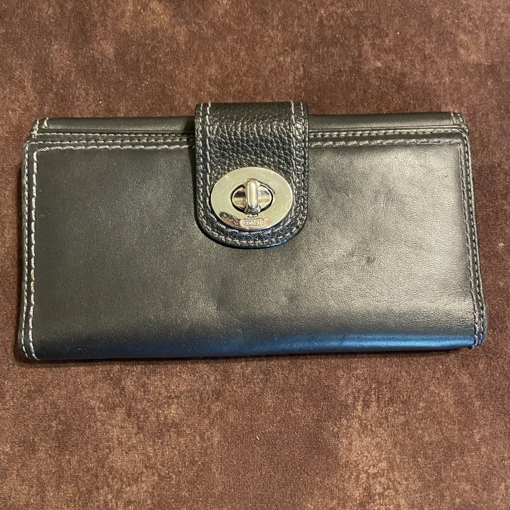Black coach wallet with silver buckle